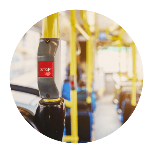 The bell button on a bus